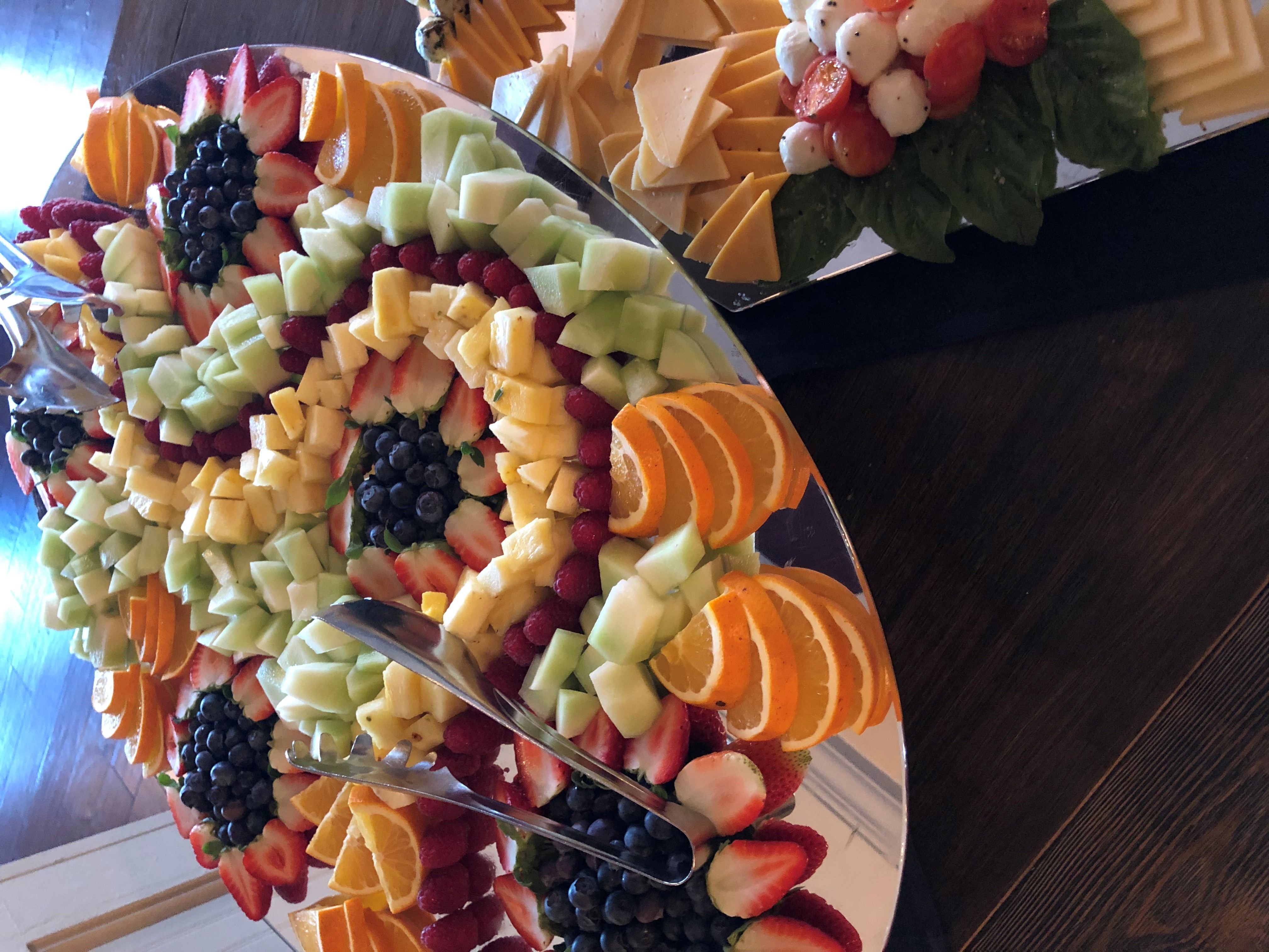 fruit spread on a mirrored tray