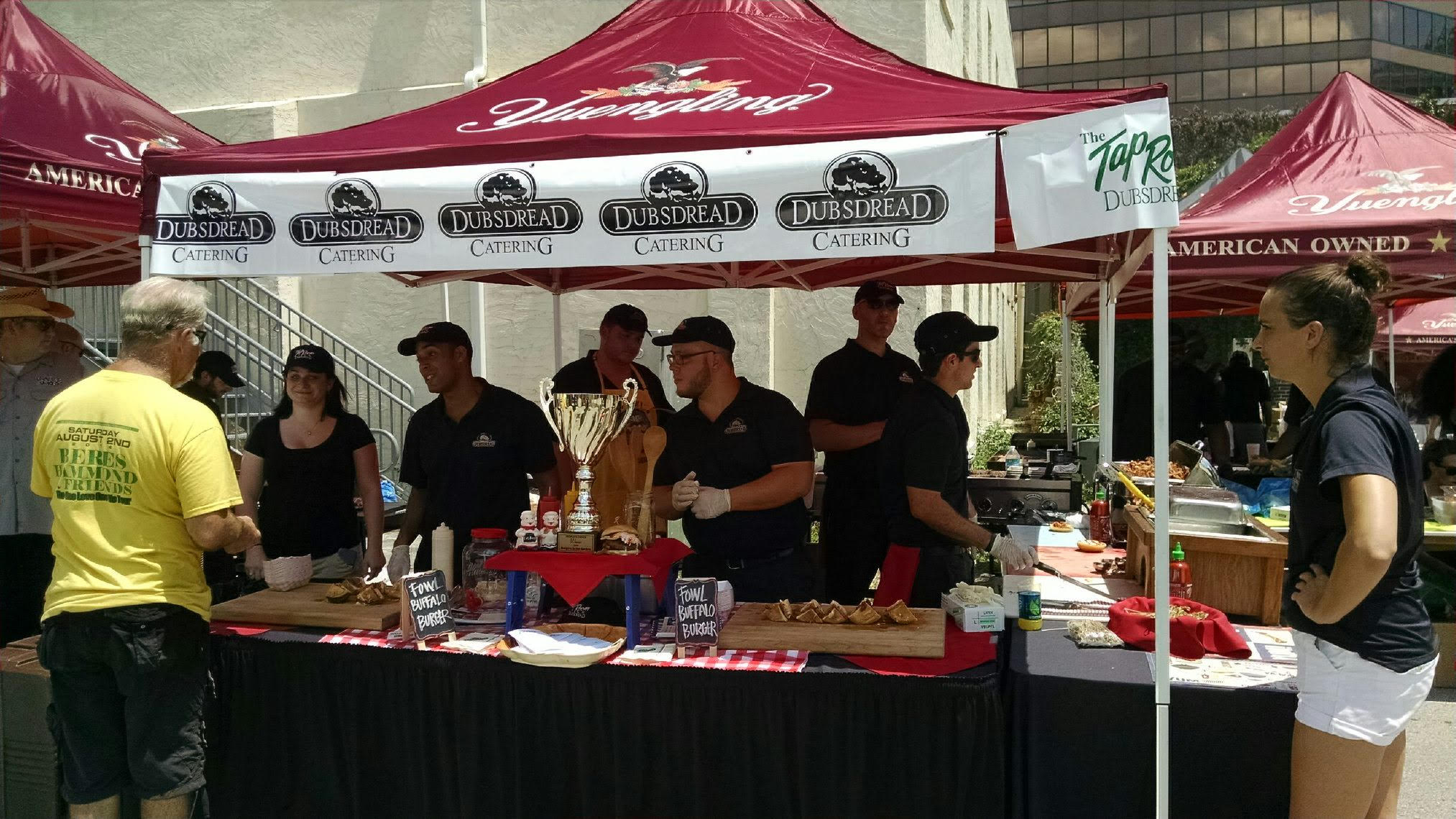 dubsdread catering crew under canopy at the burger bash